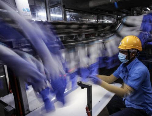Top Glove Halts Production After 2,453 Employees Test Positive For Covid-19
